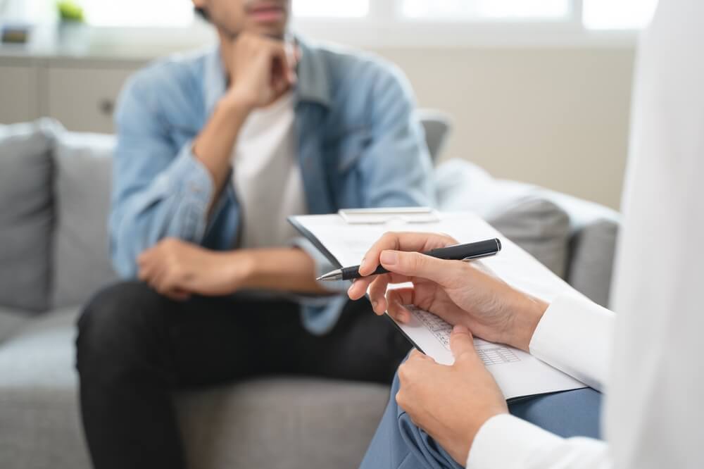 Psychologist counseling to anxiety patient and giving guidance